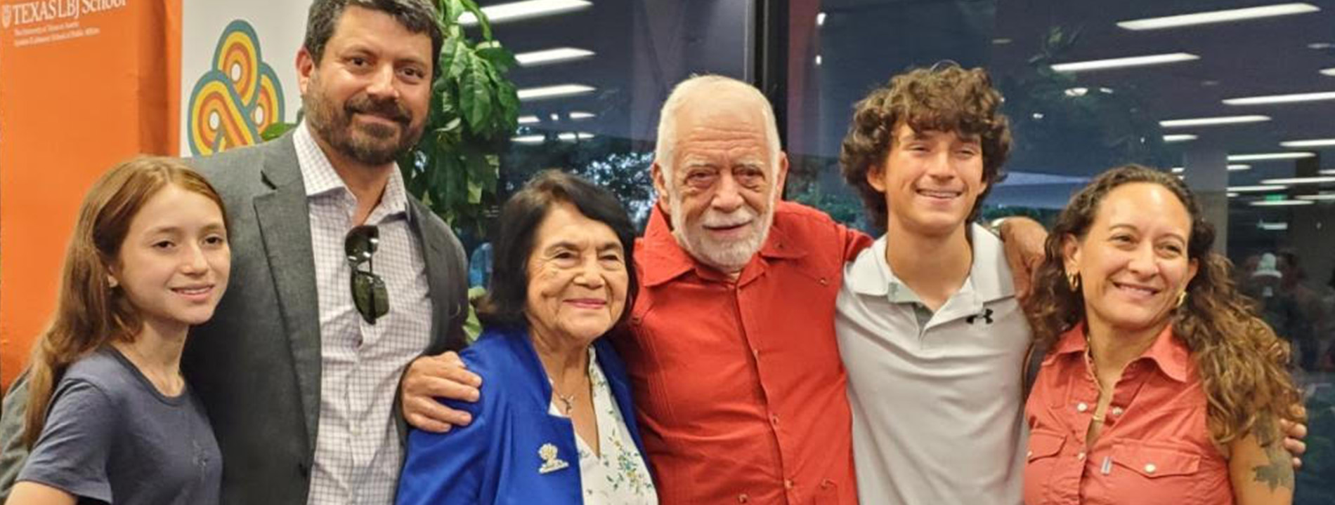 Jim Harrington with family indoors