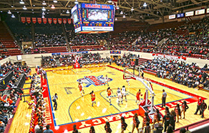 A photo of a basketball game inside Calihan Hall