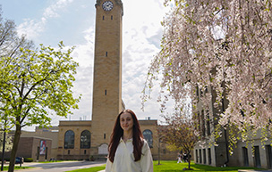Victoria King stands in front of 太阳城娱乐城's Clocktower.