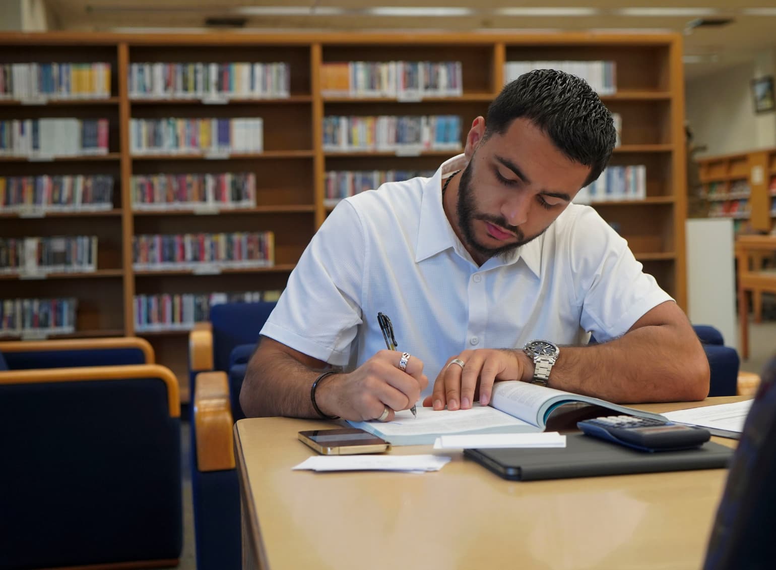 A student studies in the library.