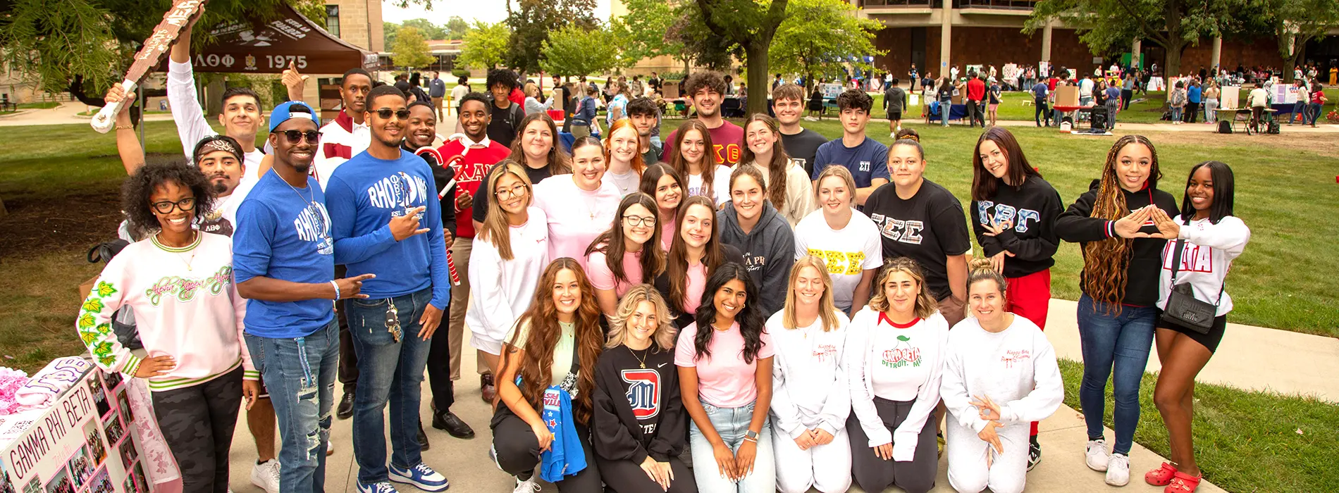 sorority  and frat group posing for photo